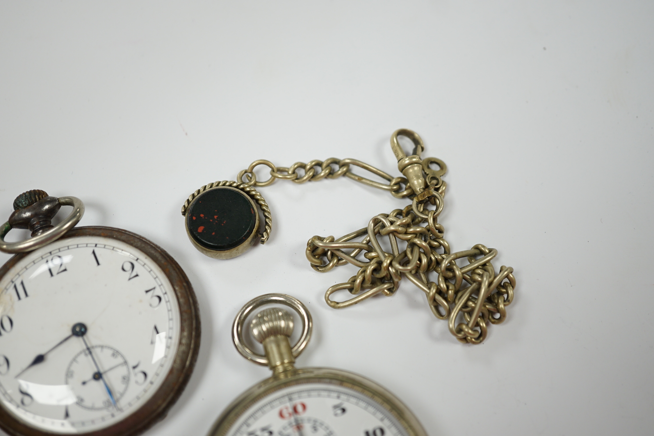 A Victorian silver open faced pocket watch, a silver fob watch, one other base metal pocket watch and a metal cased Lemania GPO stop watch, together with a base metal albert with spinning fob.